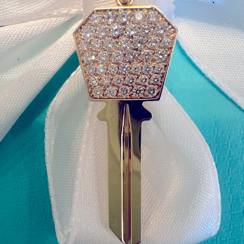 Authentic Tiffany & Co. “Modern Key” 18k yellow Gold Hexagon Key.